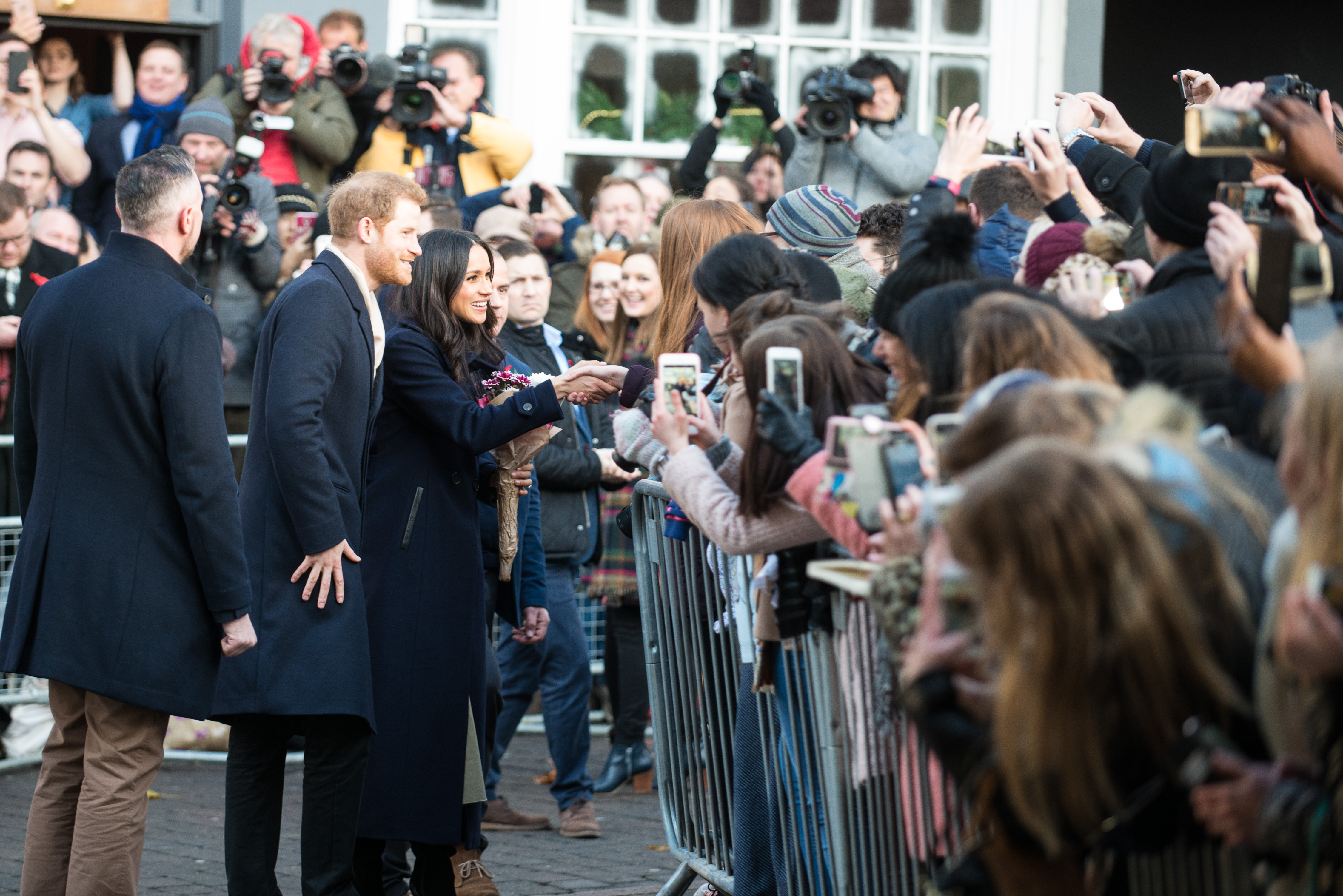 Prince Harry and Meghan Markle meeting onlookers in Nottingham