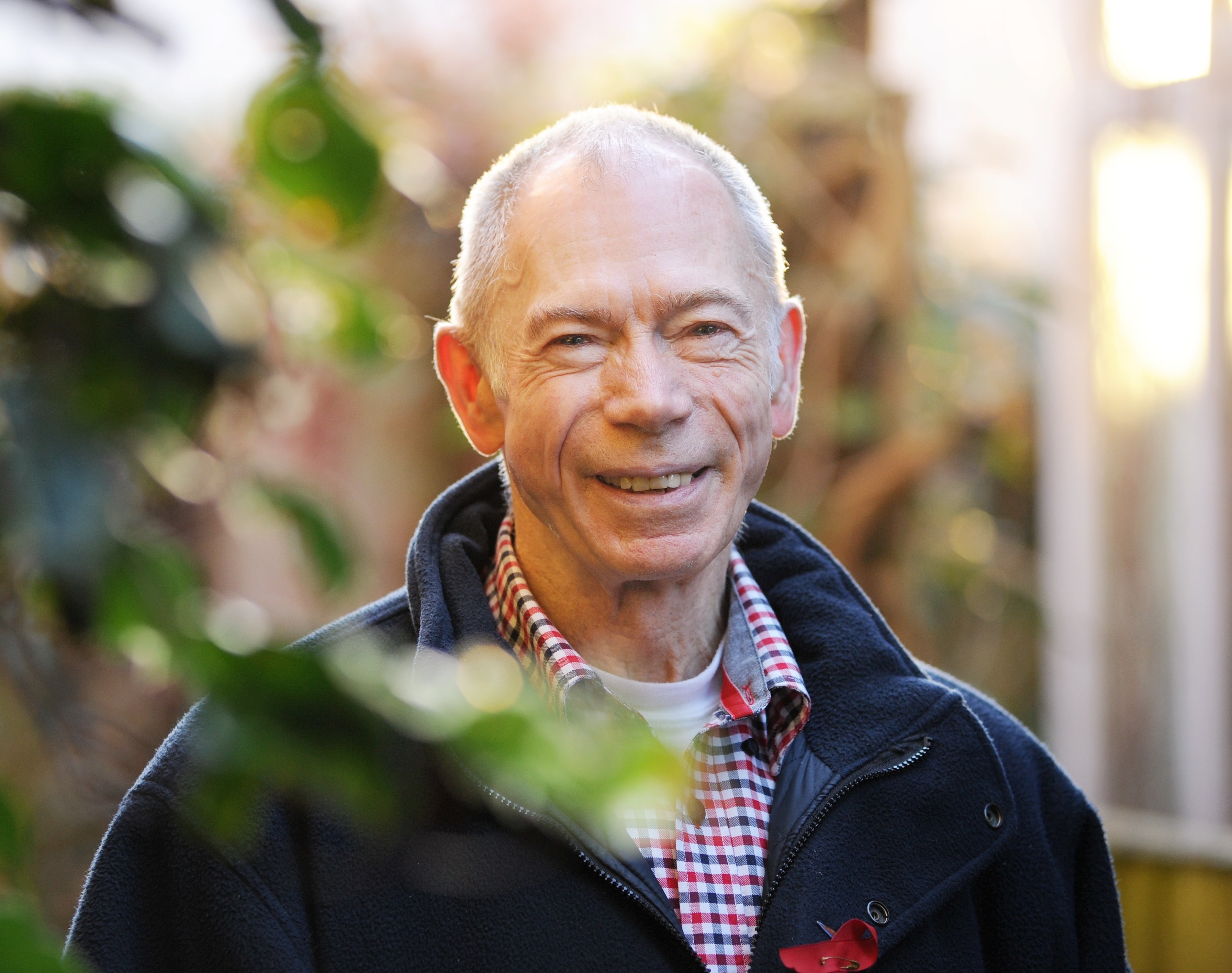 Portrait of Maurice smiling in garden