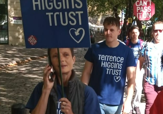 Kate Lemon holding placard