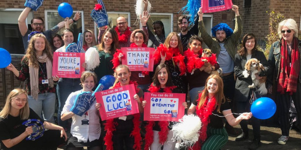 Cheer squad with good luck banners, balloons