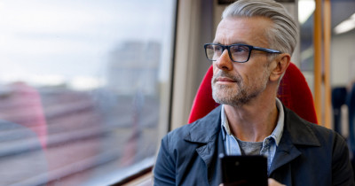 Man looking out of window